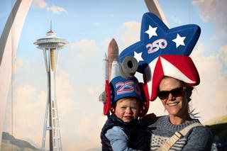A mother and child wear 'America 250' themed hats at the White House Easter Egg Roll. This year's egg roll has a more patriotic theme to celebrate the United States' upcoming 250th anniversary